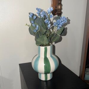Striped Green and White Vase with Blue Floral Arrangement